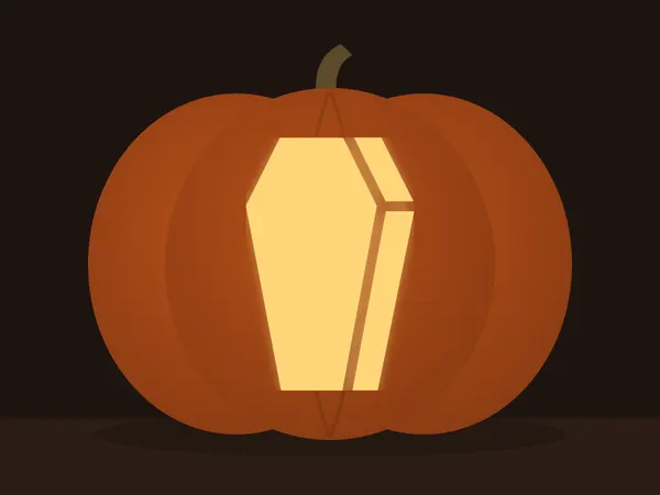 Carved pumpkin with the coffin pattern, lit by a candle