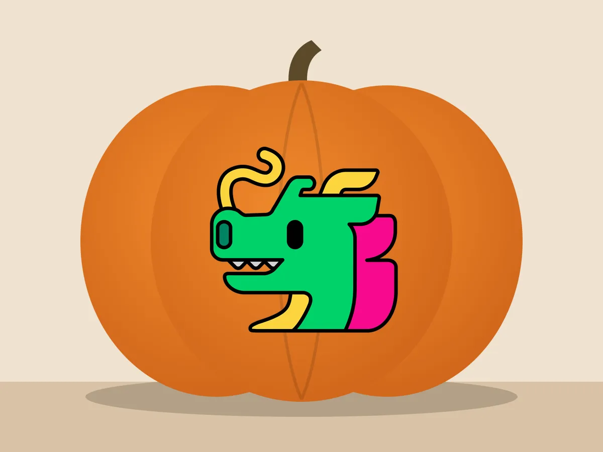 Pumpkin painted with the dragon face stencil