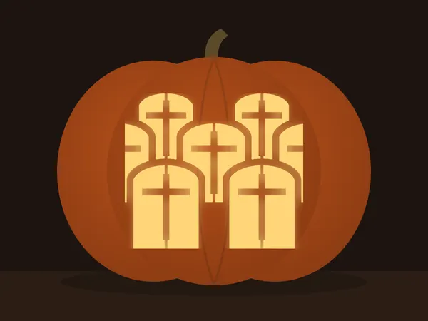Carved pumpkin with the graveyard pattern, lit by a candle