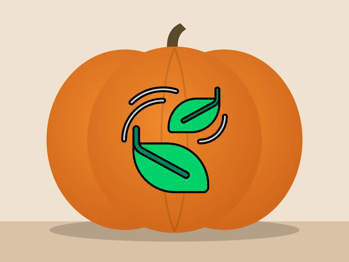 Pumpkin painted with the leaves in the wind stencil