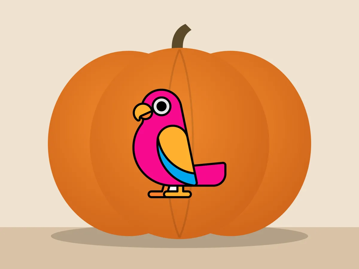 Pumpkin painted with the parrot stencil