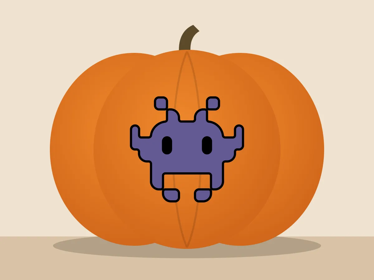 Pumpkin painted with the pixel monster stencil